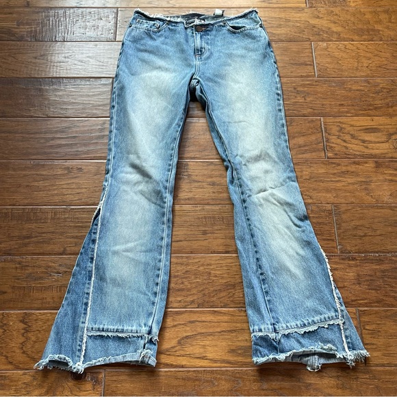 LONDONJEAN Denim - 🎉HP🎉LONDONJEAN raw hemmed asymmetrical distressed abstract flare blue jeans